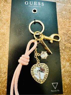 GUESS Gold-Tone Heart Crystal Keyring with Pink Cord Tassel